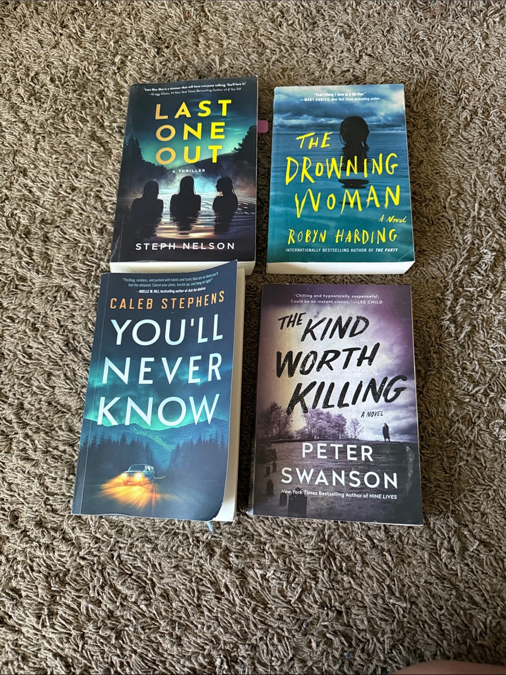 Four Mystery Paperback Books - Assorted Covers (Blue, Yellow, Purple, Teal)